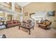 Open-concept living room with soaring ceilings and a view of the upper level at 1561 Annapolis Way, Grayson, GA 30017