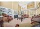 Living room boasts high ceilings and a fireplace flanked by built-in bookshelves at 1561 Annapolis Way, Grayson, GA 30017