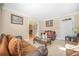 Elegant living room with neutral tones, decorative accents, and a doorway view at 1561 Annapolis Way, Grayson, GA 30017