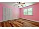 Bright bedroom featuring hardwood floors, closet and lots of natural light at 270 Hollyridge Way, Roswell, GA 30076