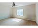 Comfortable bedroom featuring a ceiling fan and natural light, a peaceful haven at 8566 Jamestown Way, Jonesboro, GA 30238