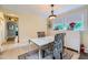 Cozy breakfast nook featuring a modern table, chairs, and built-in storage with bright natural light at 1134 Jefferson Ave, East Point, GA 30344