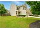 Well maintained home with green lawn, beautiful landscaping and two car garage at 119 Hardy Water Dr, Lawrenceville, GA 30045
