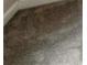 Close up of dark brown linoleum plank flooring at 119 Hardy Water Dr, Lawrenceville, GA 30045