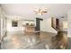 Spacious living room with wood floors, stylish lighting, and open floor plan at 119 Hardy Water Dr, Lawrenceville, GA 30045