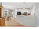 Charming kitchen with white cabinets, granite countertops, and stainless steel appliances at 2081 Township Dr, Woodstock, GA 30189