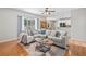 Bright and spacious living room with large windows and stylish furnishings at 2081 Township Dr, Woodstock, GA 30189