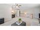 Large versatile living room featuring neutral tones and ample space for various activities and furniture arrangements at 2081 Township Dr, Woodstock, GA 30189