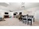 Basement space with a bar, fireplace, and multiple tv's for entertaining at 410 Beechwood Ln, Woodstock, GA 30189