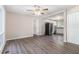 Bright and open-concept living space featuring modern flooring that flows into the adjacent kitchen at 726 Alfred Nw Rd, Atlanta, GA 30331