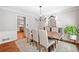 Formal dining room featuring modern decor, a stylish chandelier, and hardwood floors at 2502 Tritt Springs Ne Trce, Marietta, GA 30062