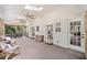 Relaxing sunroom with skylights, seating, and views of the surrounding landscape at 2502 Tritt Springs Ne Trce, Marietta, GA 30062