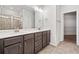Bathroom boasts double sinks, a walk-in closet and tiled floors at 4571 Grenadine Cir, Acworth, GA 30101