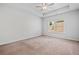 Spacious bedroom featuring a ceiling fan and a window with natural light at 4571 Grenadine Cir, Acworth, GA 30101