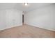 This bedroom features neutral walls, carpet, and a large closet at 4571 Grenadine Cir, Acworth, GA 30101