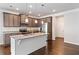 Well-appointed kitchen featuring a granite island, stainless steel appliances, and modern finishes at 4571 Grenadine Cir, Acworth, GA 30101
