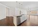 Bright kitchen features a granite island with stainless steel appliances and an open concept floor plan at 4571 Grenadine Cir, Acworth, GA 30101