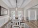 Bright dining room featuring a large mirror, lots of natural light and an open floor plan at 5105 Ashley Falls Ct, Loganville, GA 30052
