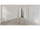 Spacious bedroom featuring closet and natural light at 1179 Chatham Rd, Buford, GA 30518