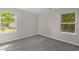Bedroom featuring neutral carpet and bright natural light at 1179 Chatham Rd, Buford, GA 30518