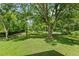 Expansive front yard with mature trees offering a picturesque setting at 1179 Chatham Rd, Buford, GA 30518