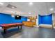 Finished basement features a pool table, bar area, and comfortable recreational space at 4341 Horder Ct, Snellville, GA 30039
