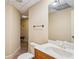 Hallway bathroom features ceramic tile floors, a vanity, and a toilet at 4341 Horder Ct, Snellville, GA 30039