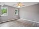 Comfortable bedroom with vinyl floors and natural light at 4341 Horder Ct, Snellville, GA 30039
