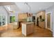 Bright kitchen with stainless steel appliances, granite countertops, and hardwood floors at 4341 Horder Ct, Snellville, GA 30039