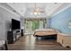 Comfortable main bedroom with vaulted ceiling and natural light at 4341 Horder Ct, Snellville, GA 30039