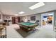 Spacious basement with pool table and entertainment area perfect for entertaining at 2505 Ridgehurst Dr, Buford, GA 30518