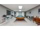 Finished basement with pool table, bar stools, and neutral gray carpet at 2505 Ridgehurst Dr, Buford, GA 30518