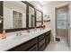 Bathroom with double vanity and large mirror, providing a functional and stylish space at 2505 Ridgehurst Dr, Buford, GA 30518