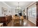 Elegant dining room featuring classic furnishings and abundant natural light at 2505 Ridgehurst Dr, Buford, GA 30518
