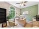 Bright home office with large window, stylish desk, and modern decor at 2505 Ridgehurst Dr, Buford, GA 30518
