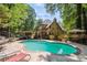 Backyard featuring a refreshing pool with ample deck space for outdoor entertaining at 2505 Ridgehurst Dr, Buford, GA 30518