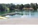Waterfront property with private boat dock offering lake access and scenic views at 2505 Ridgehurst Dr, Buford, GA 30518
