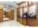 The coffee station features a built-in coffee maker with multiple white decorative vases and black counter at 3445 Stratford Rd # 3102, Atlanta, GA 30326