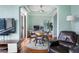 Charming dining area with a round table, workspace, and view of a living space at 3445 Stratford Rd # 3102, Atlanta, GA 30326