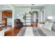 Open-concept living area with modern furnishings, hardwood floors, and a seamless flow to the kitchen at 3445 Stratford Rd # 3102, Atlanta, GA 30326