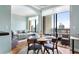 The living space features a living room, dining area, and access to a balcony with city views at 3445 Stratford Rd # 3102, Atlanta, GA 30326