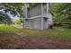 The property has a large backyard with mature trees, and space for outdoor activities and relaxation at 3498 Newberry Trl, Decatur, GA 30034