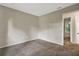 Bright bedroom features a neutral color scheme and an entrance to the bathroom at 3498 Newberry Trl, Decatur, GA 30034