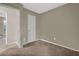 Comfortable bedroom featuring carpet floors, neutral walls, closet and a peek into another room at 3498 Newberry Trl, Decatur, GA 30034