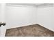 Walk-in closet provides ample storage with built-in shelves and carpet flooring at 3498 Newberry Trl, Decatur, GA 30034