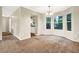 Open dining room with several large windows providing ample natural light at 3498 Newberry Trl, Decatur, GA 30034