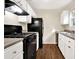 Efficient kitchen with black appliances, practical countertops, and bright lighting at 3498 Newberry Trl, Decatur, GA 30034