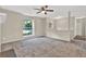 Inviting living area with a ceiling fan, and seamless flow to other rooms at 3498 Newberry Trl, Decatur, GA 30034