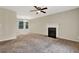 Comfortable living room featuring a classic fireplace and neutral decor at 3498 Newberry Trl, Decatur, GA 30034