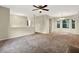 Expansive open-concept living space with adjacent dining and entry areas at 3498 Newberry Trl, Decatur, GA 30034